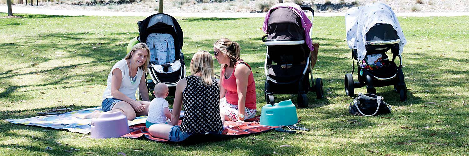 Mothers have a picnic in a park with their babies. Blacktown, NSW. Credit: NSW Department of Planning and Environment / Sarah Rhodes