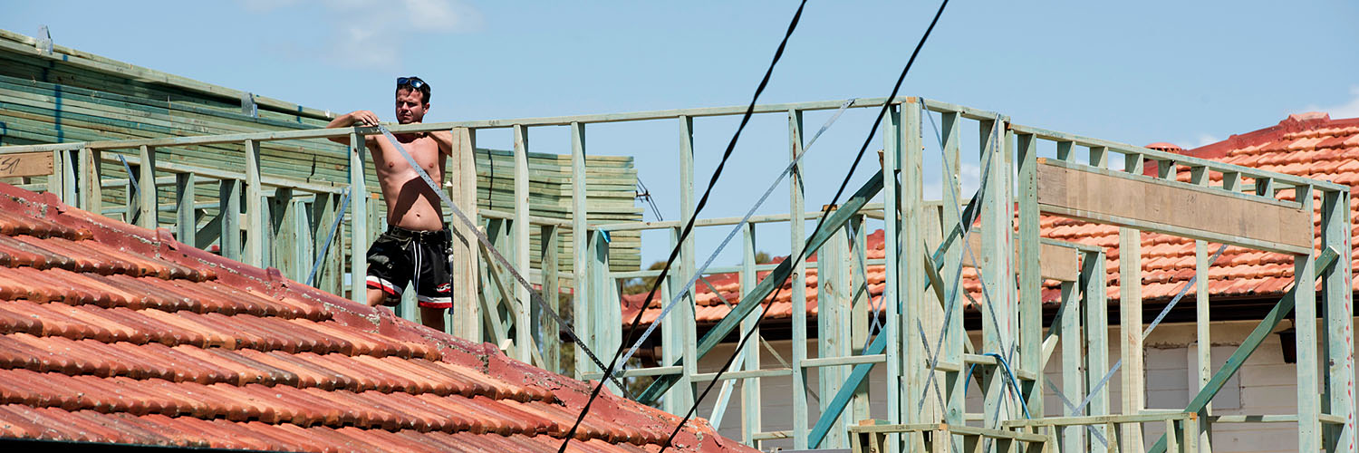 A builder works on a house under construction. Credit: NSW Department of Planning and Environment / Sarah Rhodes