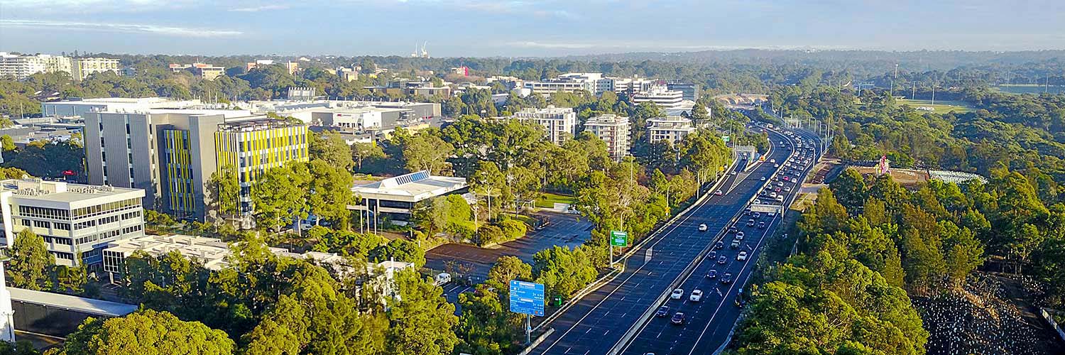 Aerial view of a major infrastructure corridor.