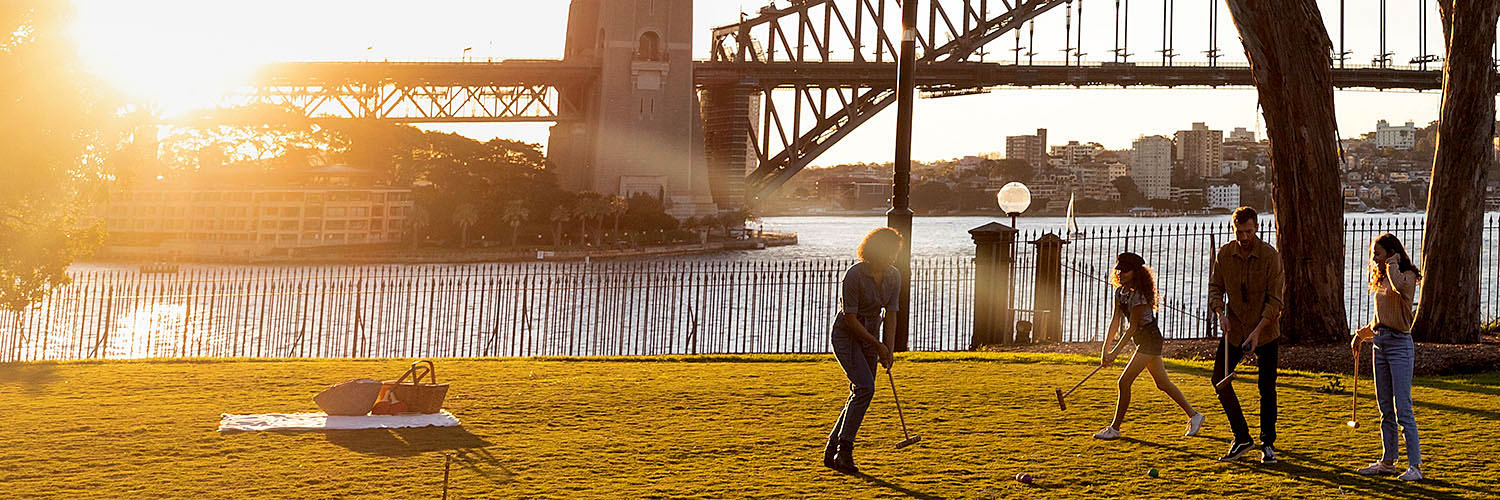 Family enjoying a day out in the Royal Botanic Garden, Sydney. Credit: Destination NSW