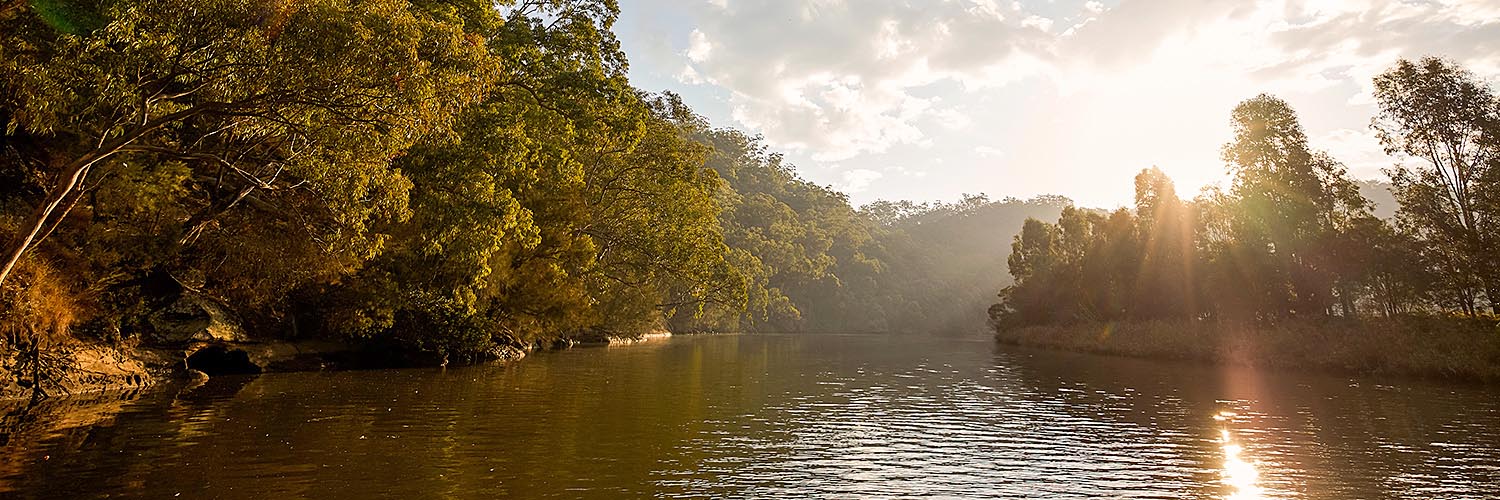 Sun setting over the Hawkesbury River, Wisemans Ferry. Credit: Destination NSW