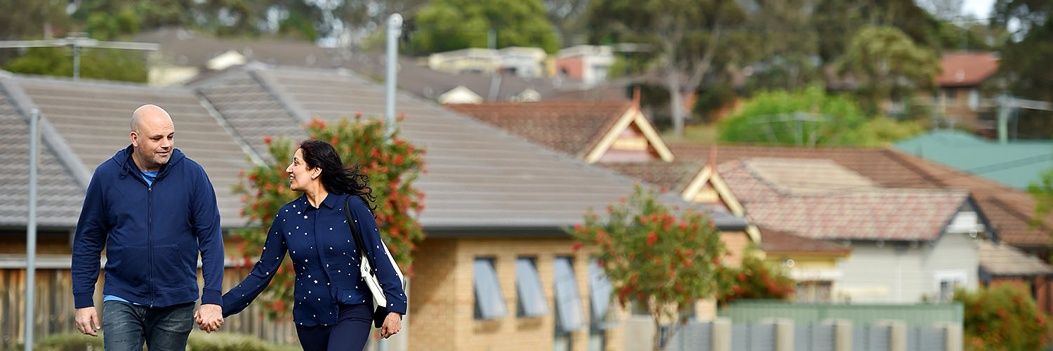 Couple walking in a residential area in Westmead, Western Sydney NSW. Credit: NSW Department of Planning and Environment / Adam Hollingworth