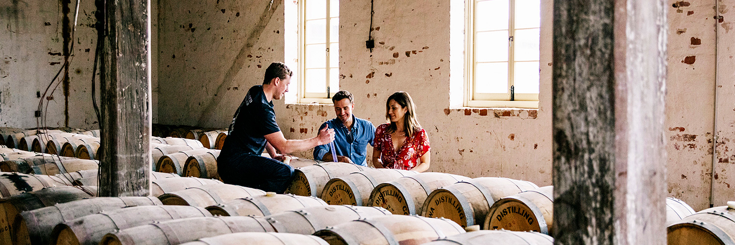 Couple enjoying a visit to Corowa Whisky & Chocolate, Corowa. Credit: Destination NSW