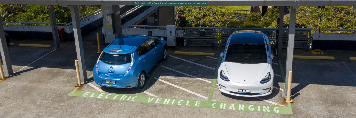 Electrical vehicles at a charging station.