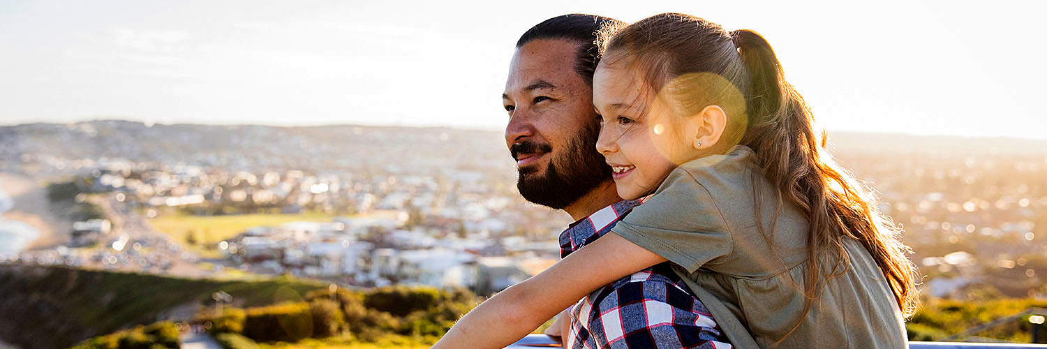 Father and daughter enjoying a walk along the Newcastle Memorial Walk, The Hill. Credit: Destination NSW