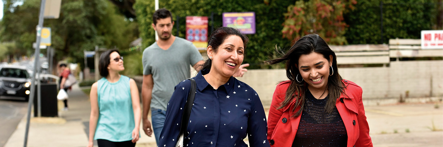 Ladies walking down a residential street in Wentworthville, Western Sydney NSW. Credit: NSW Department of Planning and Environment / Adam Hollingworth