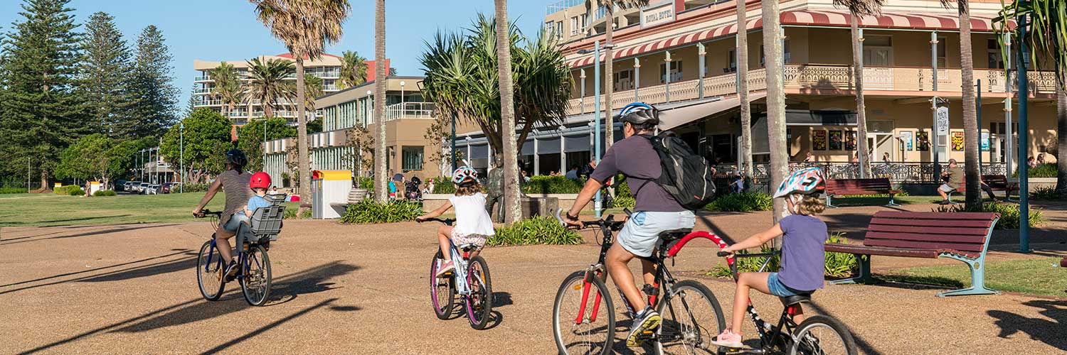 Family cycling in Port Macquarie.