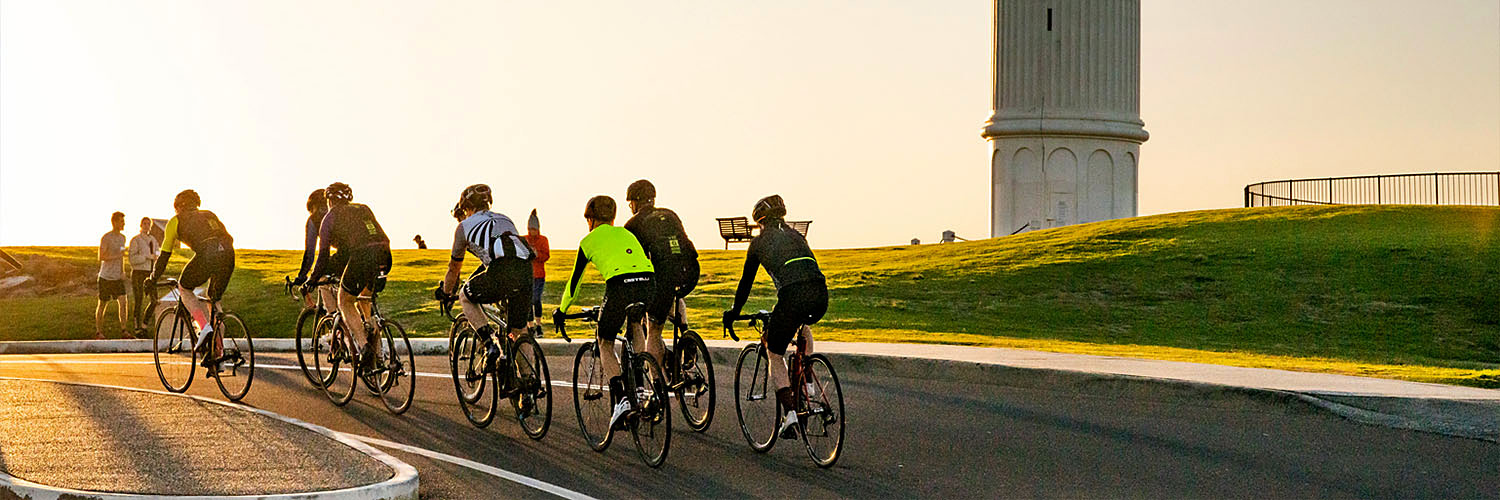 Group of cyclists riding in the Illawarra-Shoalhaven region.