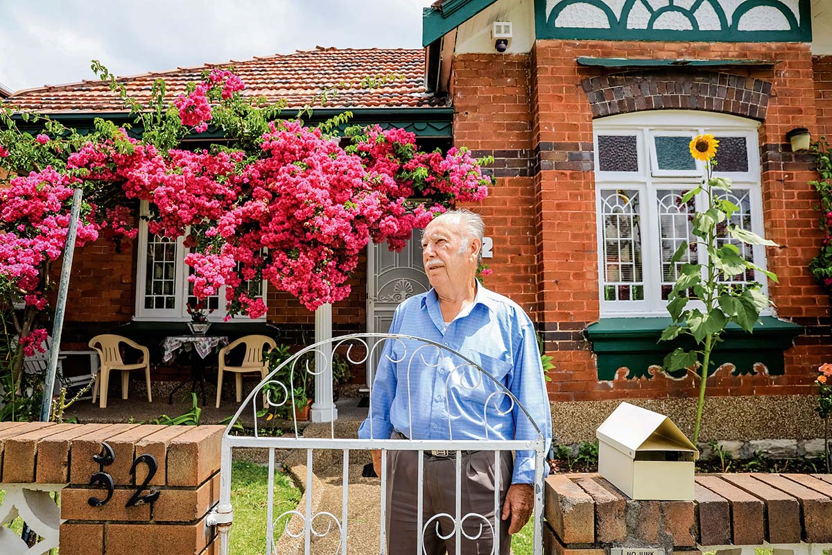 An elderly man stands in his front garden. Dulwich Hill, Sydney, NSW. Credit: NSW Department of Planning and Environment / Salty Dingo