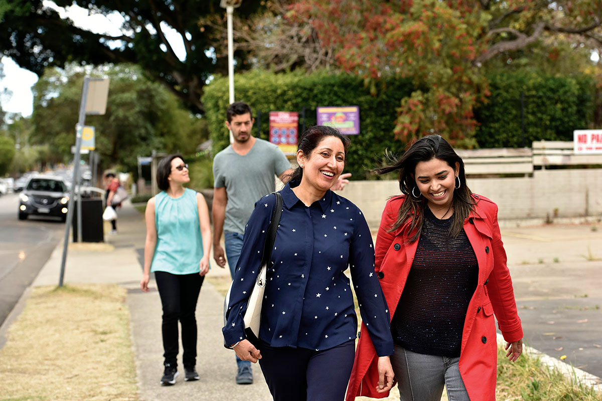 Ladies walking down a residential street in Wentworthville, Western Sydney NSW. Credit: NSW Department of Planning and Environment / Adam Hollingworth