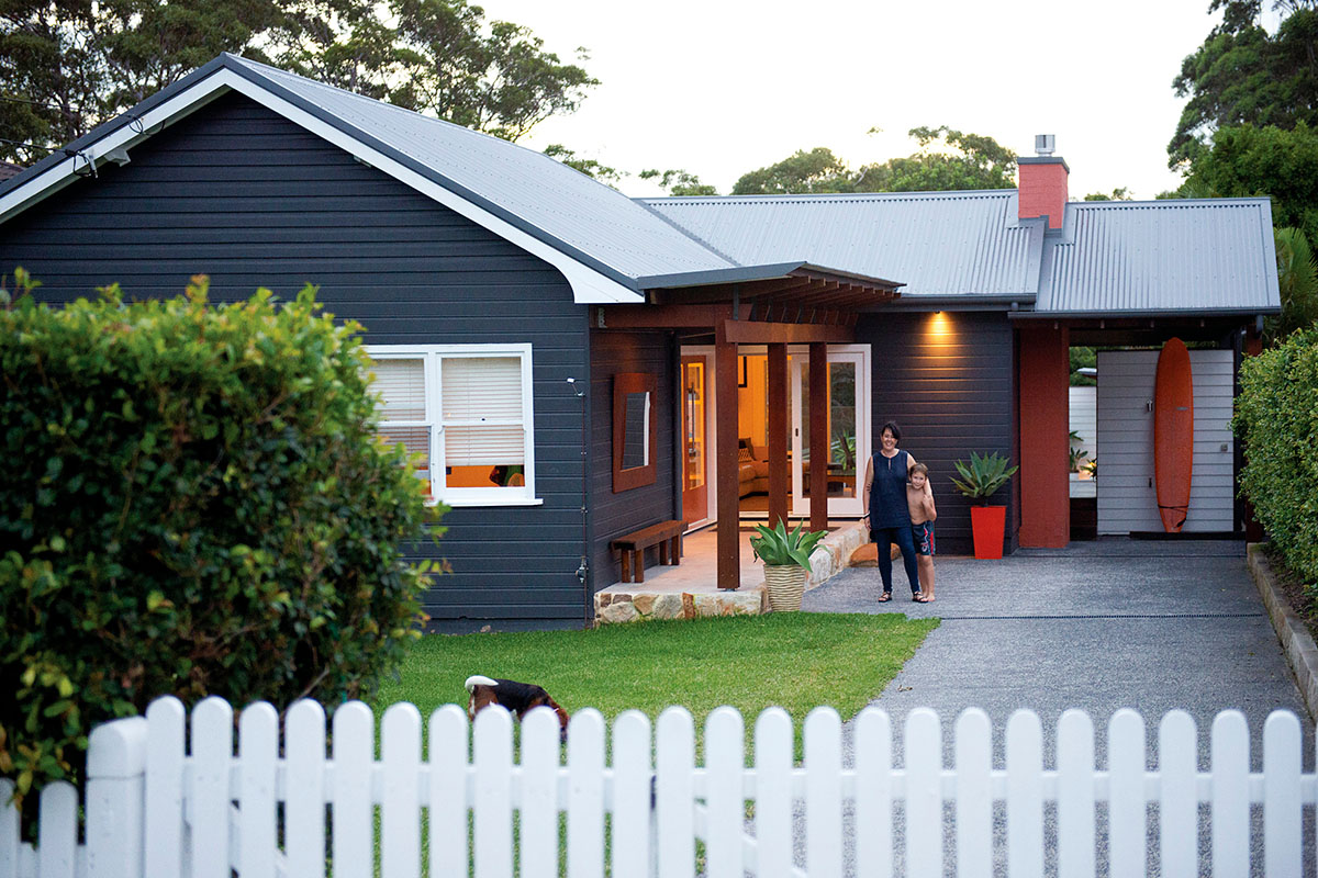Mother and son standing in the front yard of the Manly Vale House, Sydney. Credit: NSW Department of Planning and Environment / Salty Dingo
