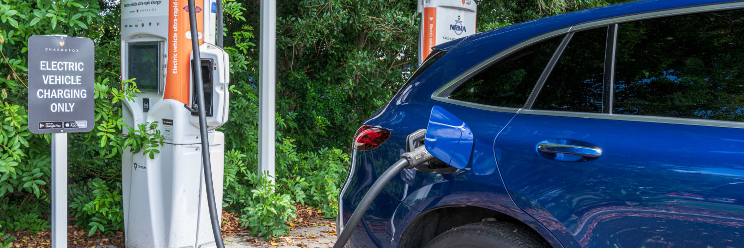 Electrical vehicle at a charging station.