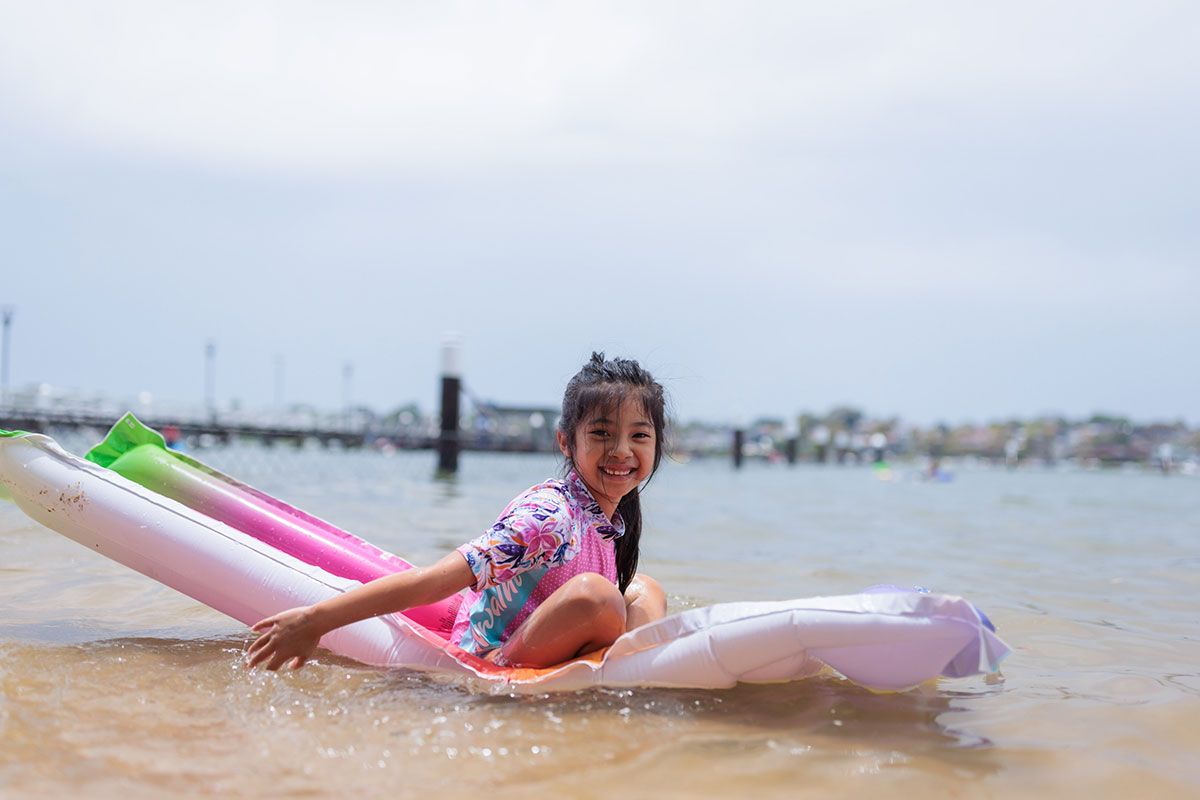 Girl on float at the beach at Bayview Baths. Credit: City of Canada Bay