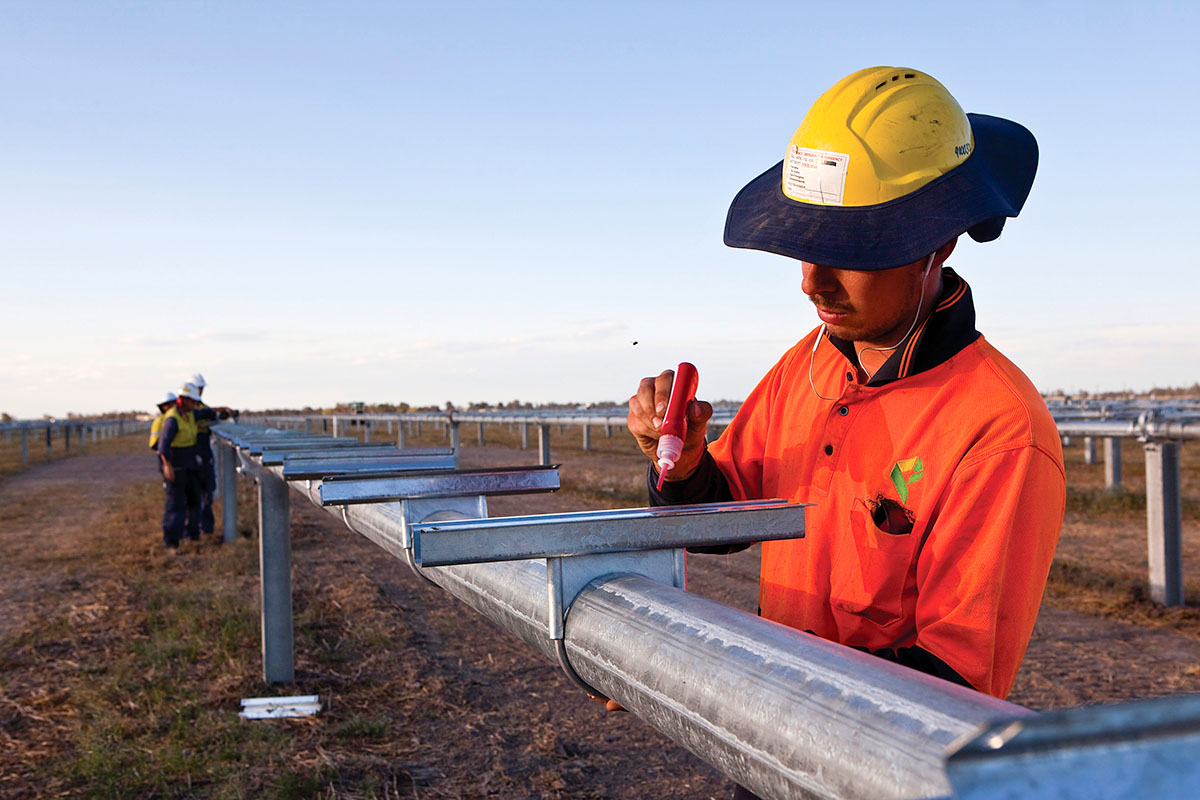 Workers during set up at Moree Solar Farm. Moree, NSW. Credit: NSW Department of Planning and Environment / Neil Fenelon