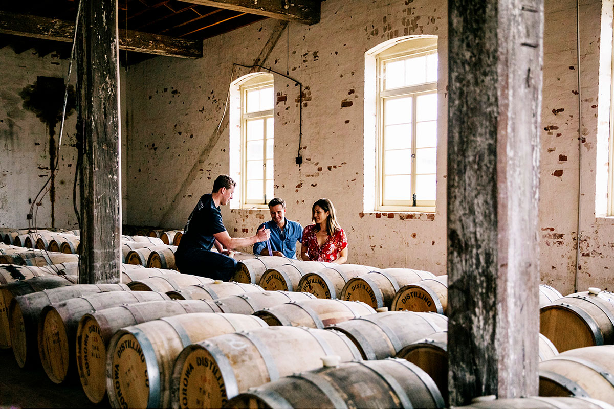 Couple enjoying a visit to Corowa Whisky & Chocolate, Corowa. Credit: Destination NSW