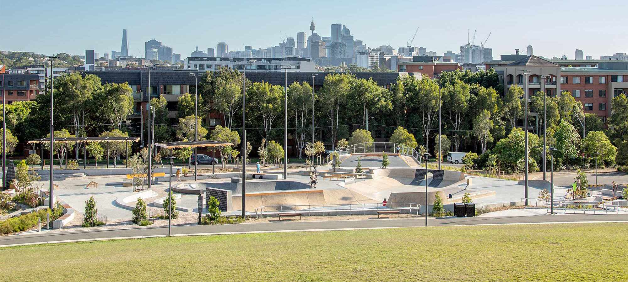 Sydney Park skate park at Alexandria with the Sydney CBD in the background. Credit: NSW Department of Planning and Environment