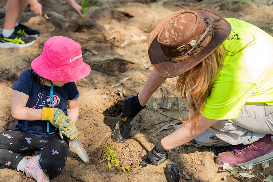 People getting involved in a community bushcare program. Credit: The Enchanted Trove