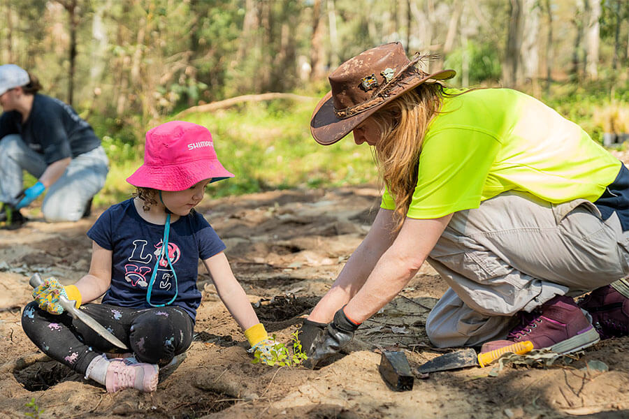 People getting involved in a community bushcare program. Credit: The Enchanted Trove