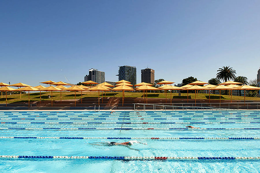 Better look and feel: The bright yellow shade umbrellas attract attention and celebrate the pool’s renewal. Credit: GANSW