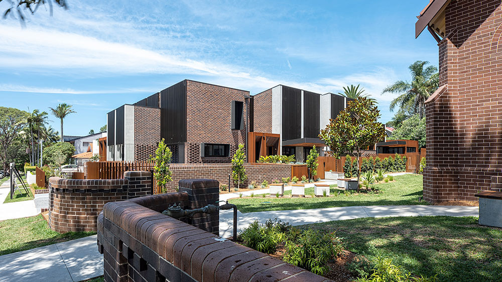 The Abbey is an amalgamation of 2 lots containing a heritage-listed community church and 2 dwellings sold by the church. Credit: Tom Ferguson. Source: AJH+