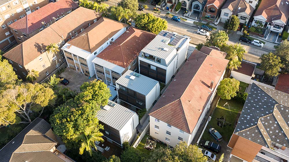 Making the most of a smaller site, this multi-use development contains town houses, apartments, shops and an underground carpark. Credit: Tom Ferguson. Source: McGregor Westlake Architecture