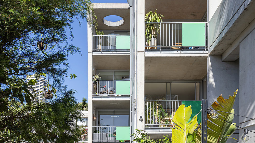 Although the Bourke Street apartments face a busy motorway, clever design and layout protect the homes from noise and other sensory challenges. Credit: Brett Boardman. Source: McGregor Westlake Architecture