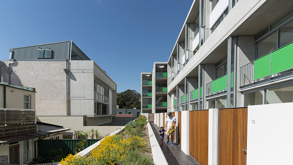 Although the Bourke Street apartments face a busy motorway, clever design and layout protect the homes from noise and other sensory challenges. Credit: Brett Boardman. Source: McGregor Westlake Architecture