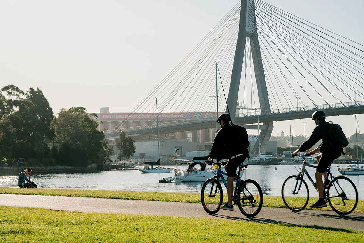 People cycling along the Glebe foreshore and park area. Credit: Lisa Madden/DPHI
