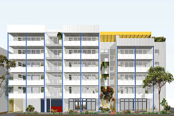 Street view of 6 storey apartment with red bricks.