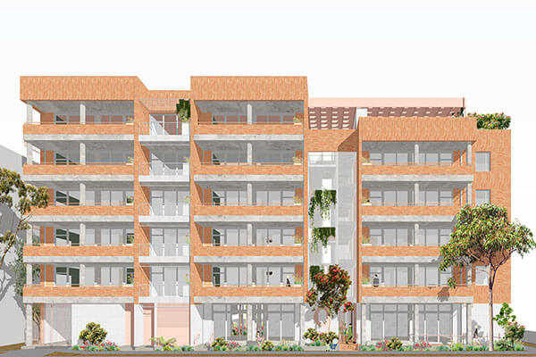 Street view of 6 storey apartment with blonde bricks.