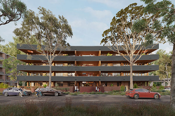 Street view of 4 storey apartment with dark grey masonry.