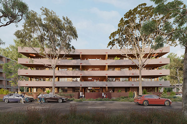 Street view of 6 storey apartment with light terracotta masonry.