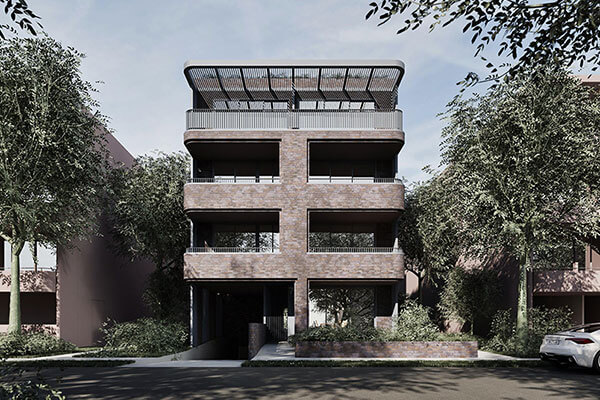 Street view of 4 storey apartment with dark brown bricks. 