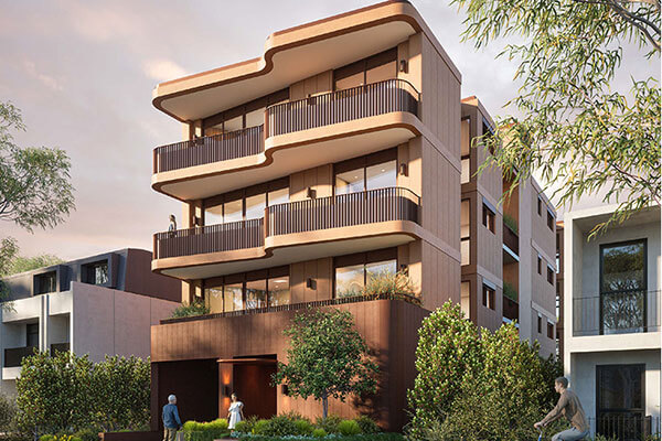 Street view of 4 storey apartment with compressed fibre cement sheeting. 